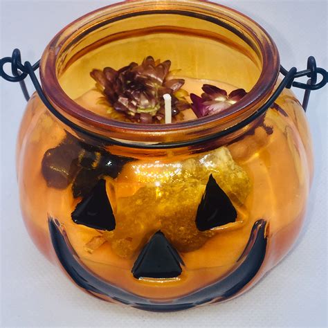 empty pumpkin candle jars